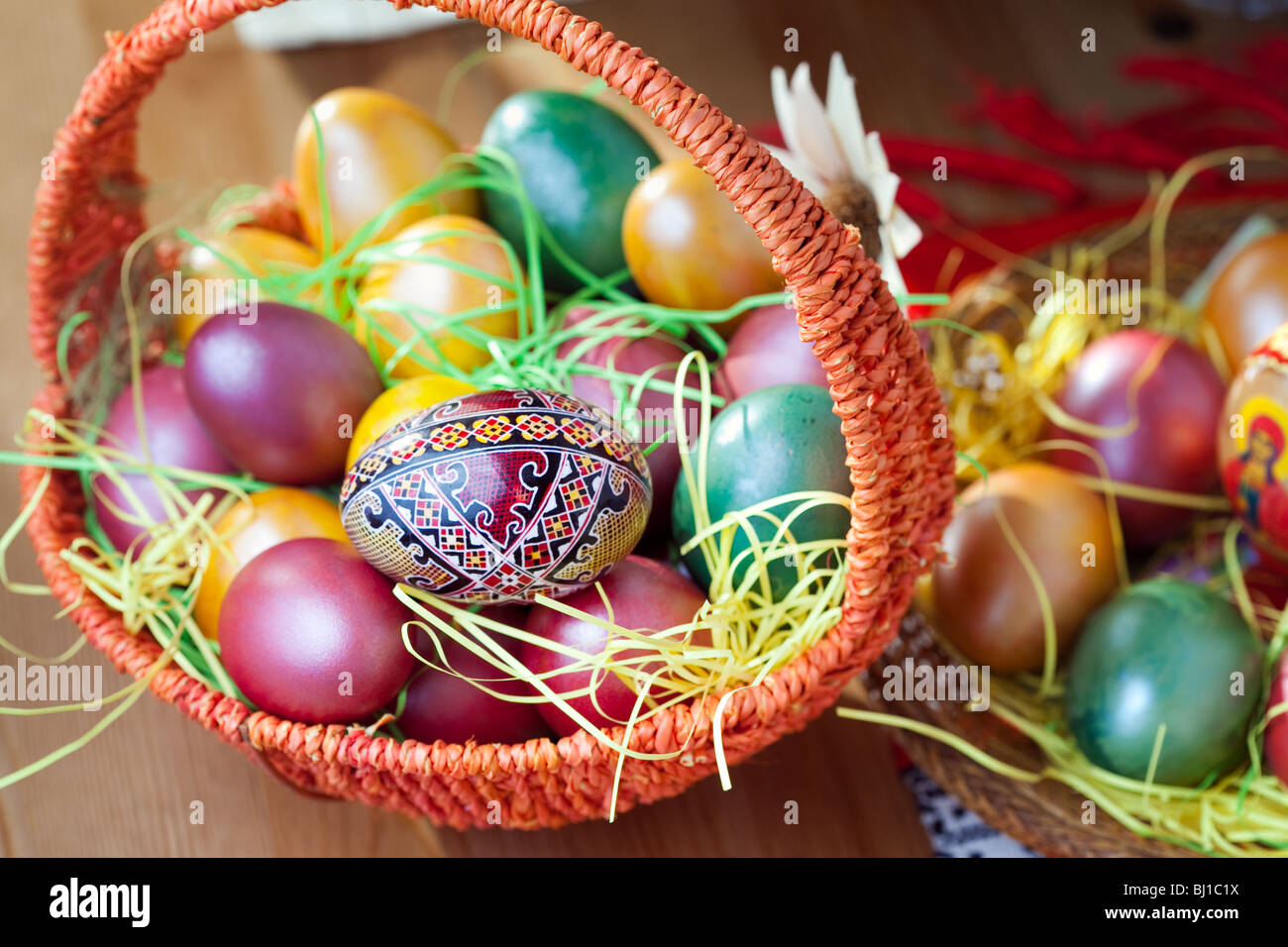 Colorful easter painted eggs in a basket Stock Photo