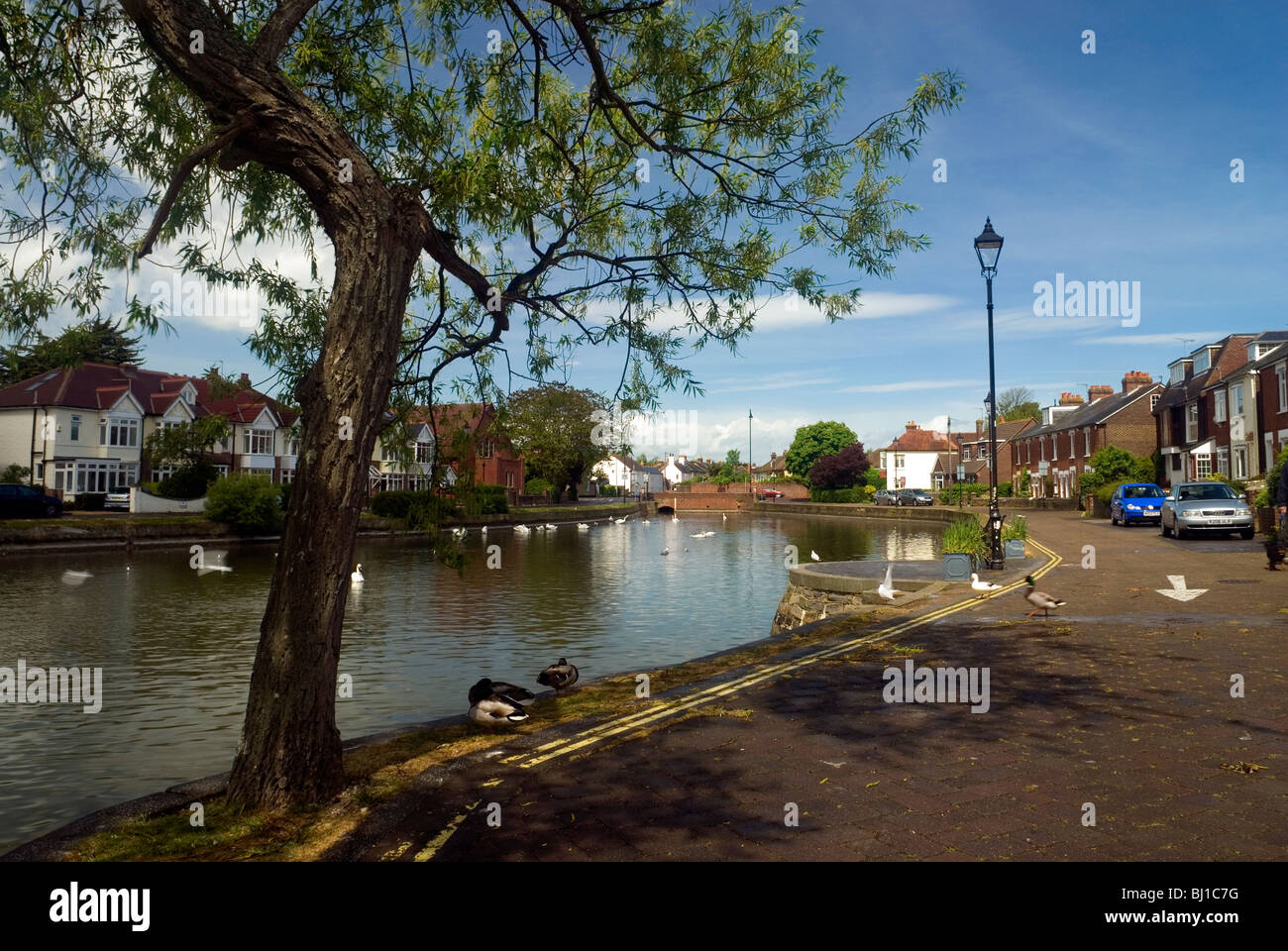 The River Ems and tidal Mill Pond at Emsworth with terraced housing