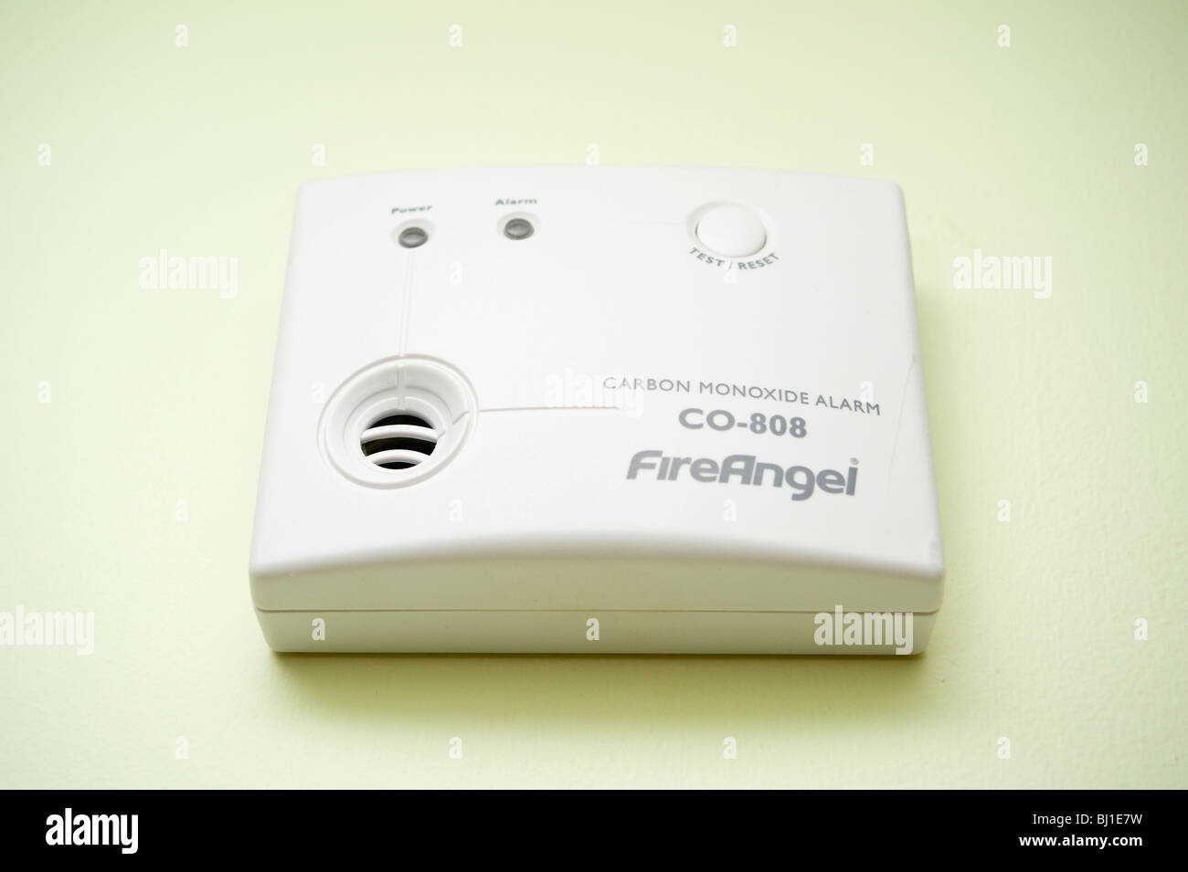 A Fire Angel carbon monoxide alarm fitted on an interior wall Stock Photo