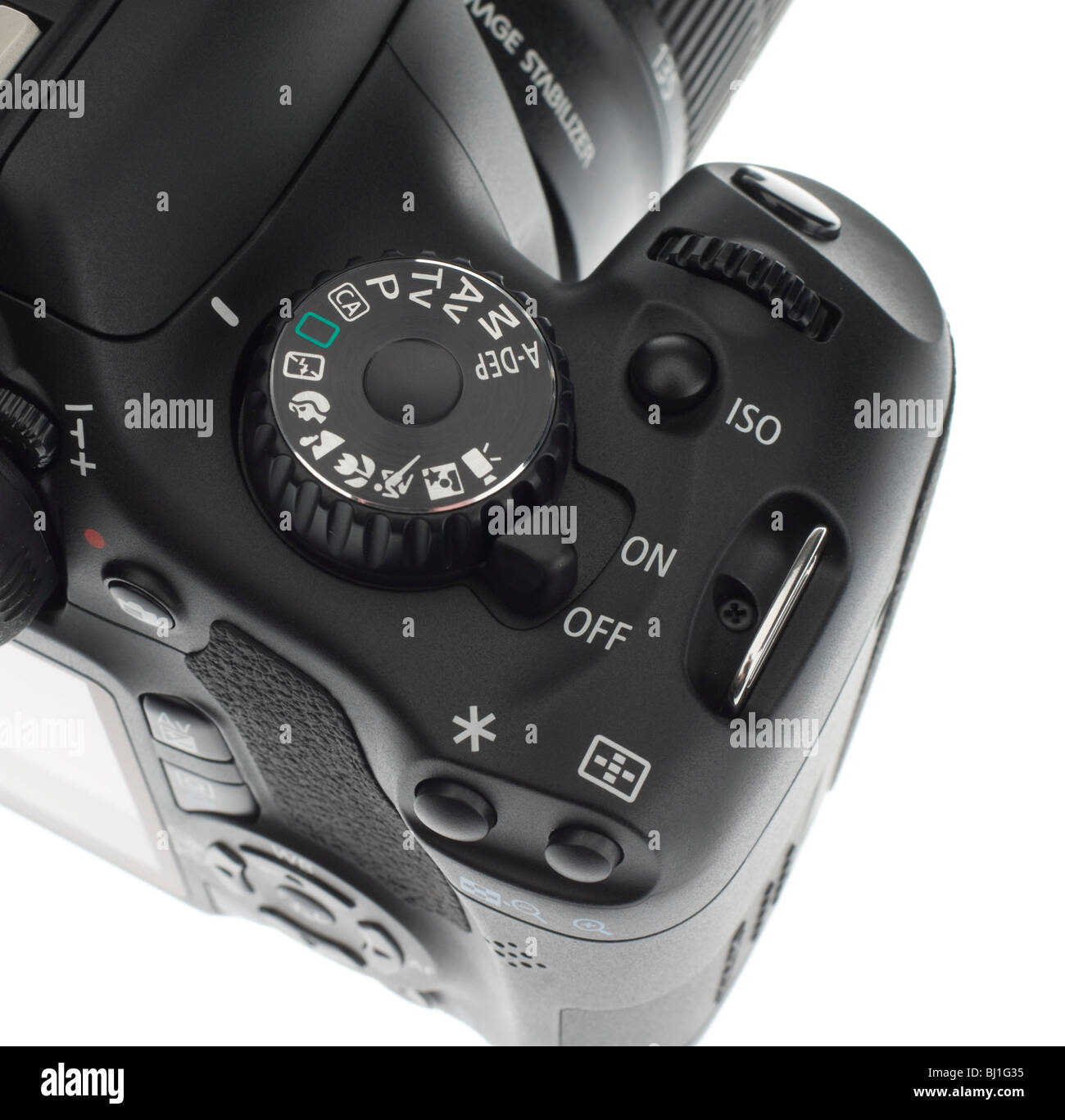 EOS 550D Right-hand grip showing shutter release, control wheel, main mode and settings dial, ISO setting, on-off switch. Stock Photo