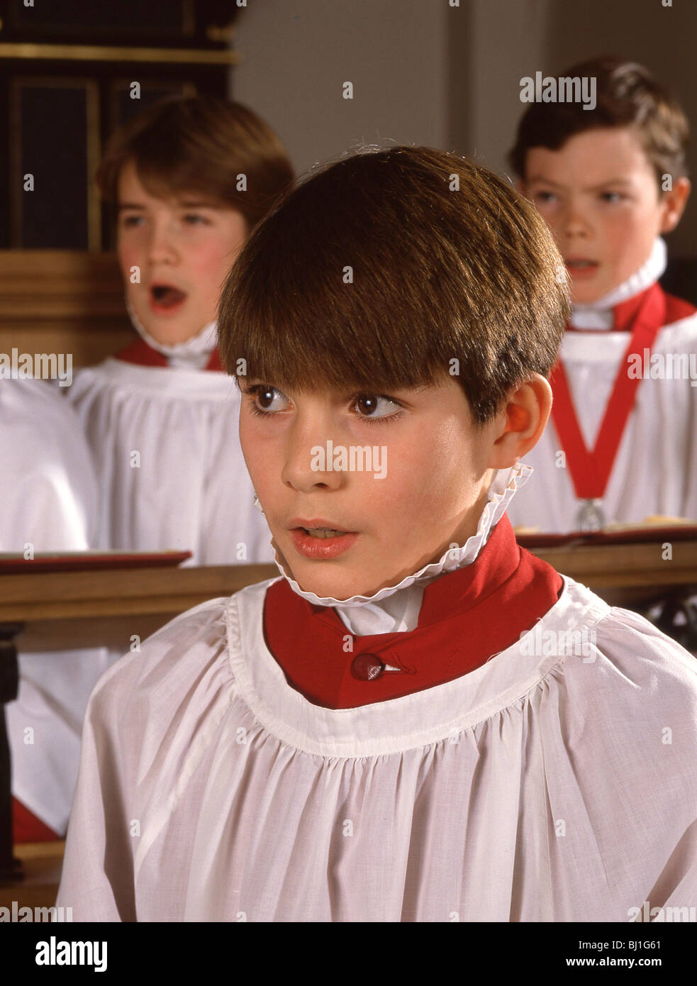Young boy singer in church choir, Guildford, Surrey, England, United Kingdom Stock Photo
