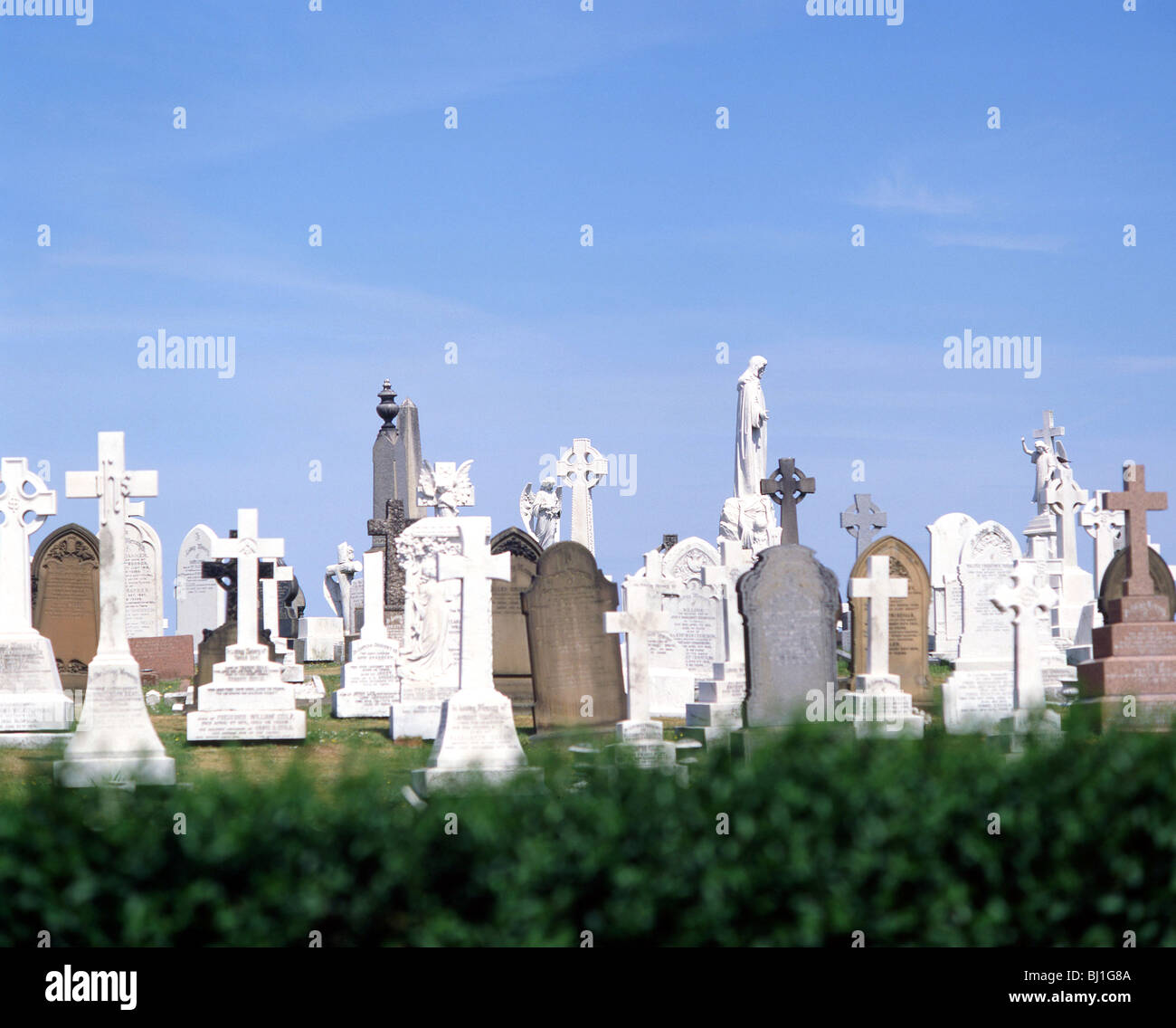 Headstones in church cemetery, Surrey, England, United Kingdom Stock Photo