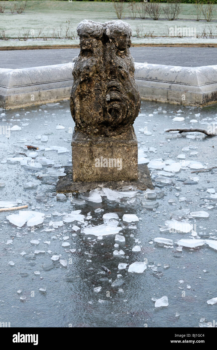 frozen iced ice fountain pond waterpond castle park kilkenny ireland winter Stock Photo
