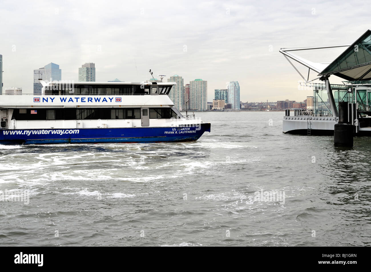 ny waterway ferry leaving the manhattan terminal for jersey city, nj