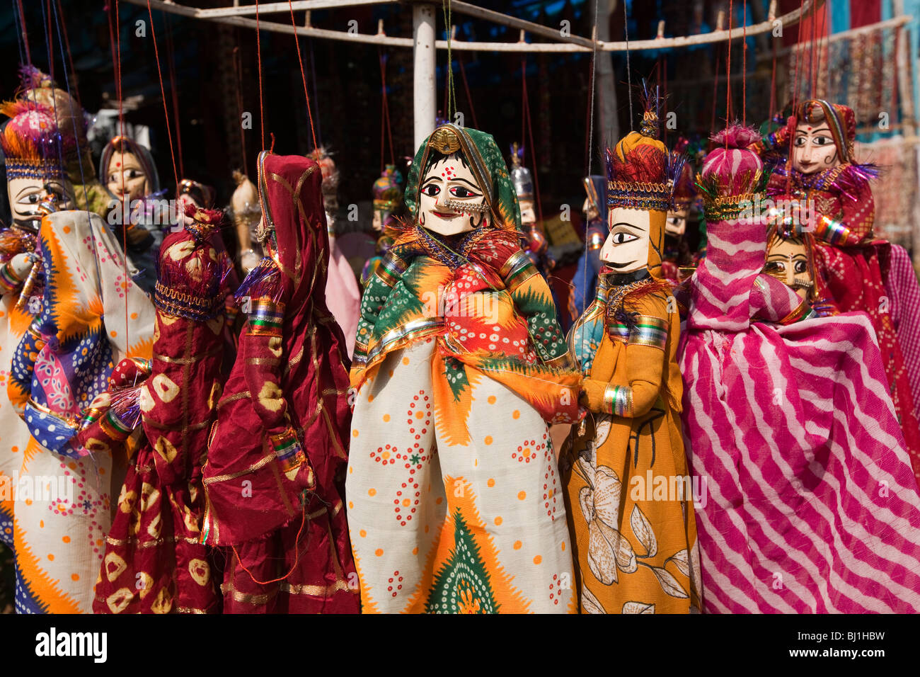 India, Kerala, Kochi, Fort Cochin, display of inexpensive souvenir puppets for sale Stock Photo
