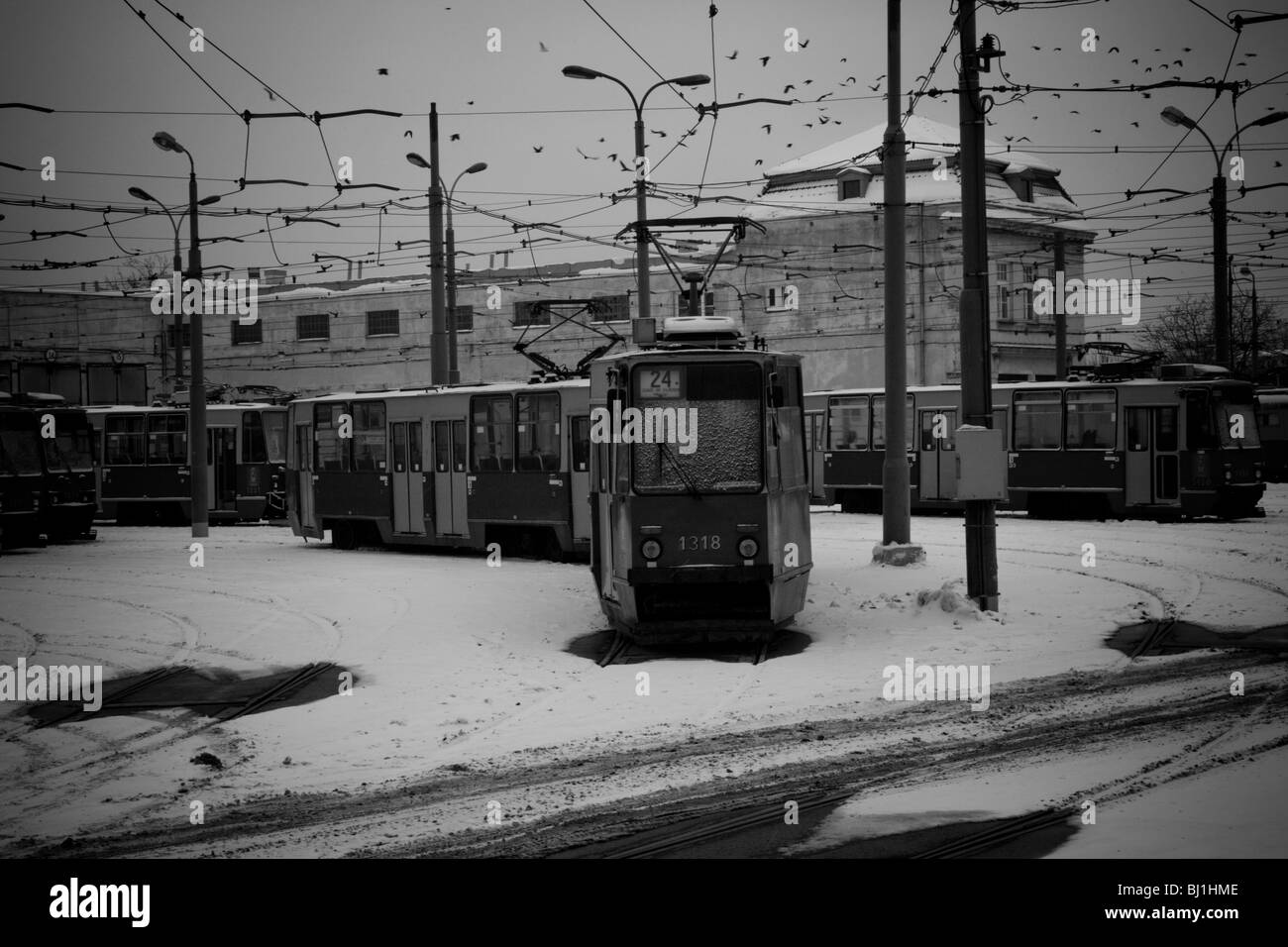 Trams depot and crows in winter in the city center of Warsaw Poland, Eastern Europe, EU Stock Photo