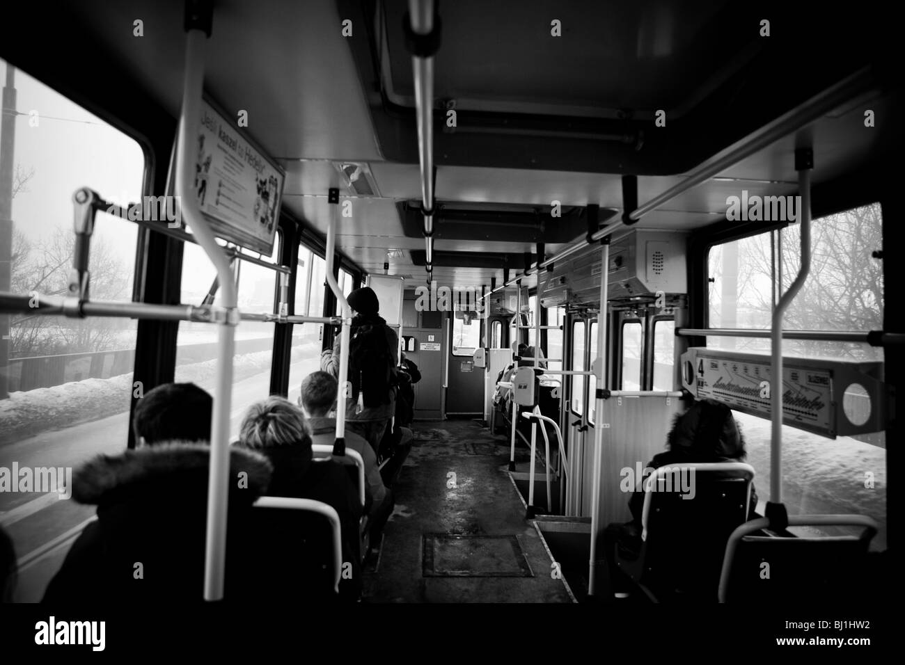 Interior of a streetcar or tramway car in the downtown area of Warsaw with passengers on seats, Poland, Eastern Europe, EU Stock Photo