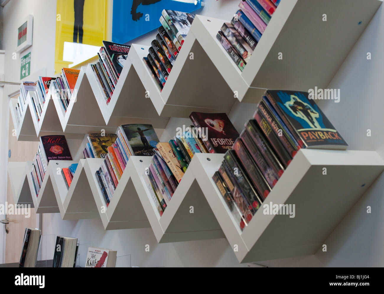 Books on shelves at Hamworthy Library Stock Photo