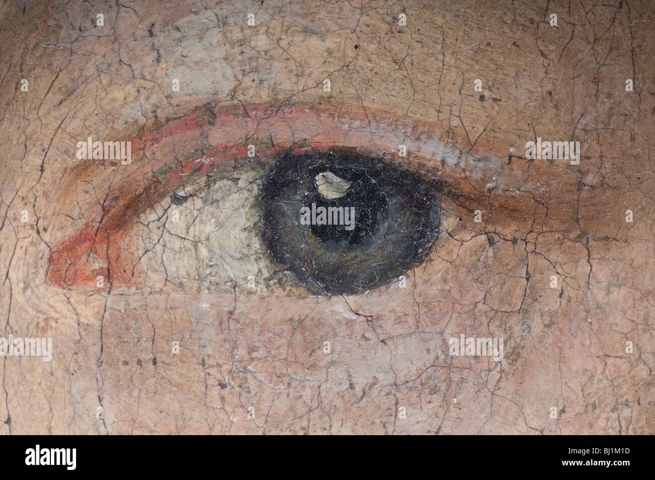 Detail of a woman's eye on an old baroque oil painting. Stock Photo