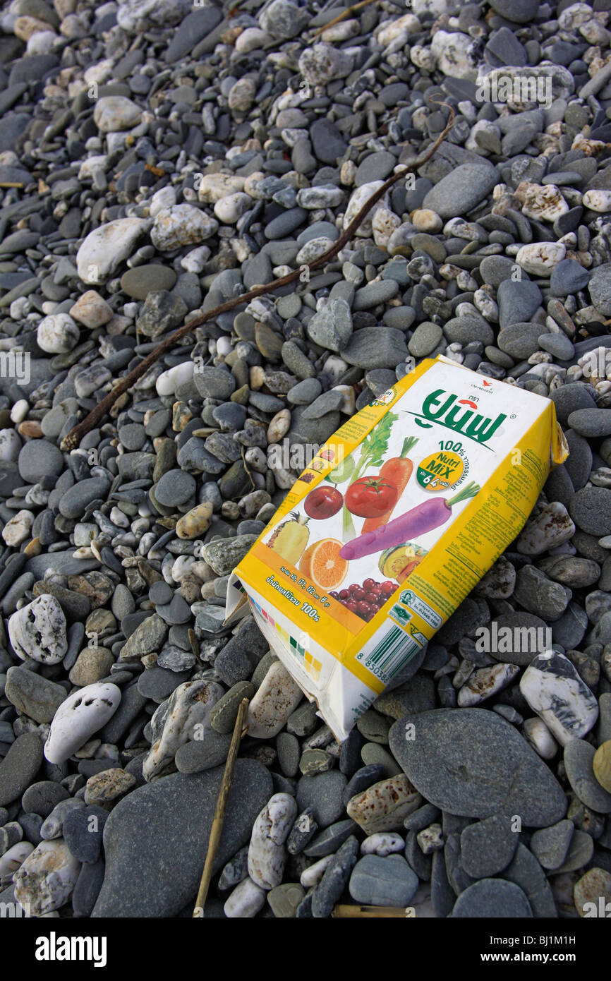 Fruit Juice drink carton washed up on Cornish beach Stock Photo