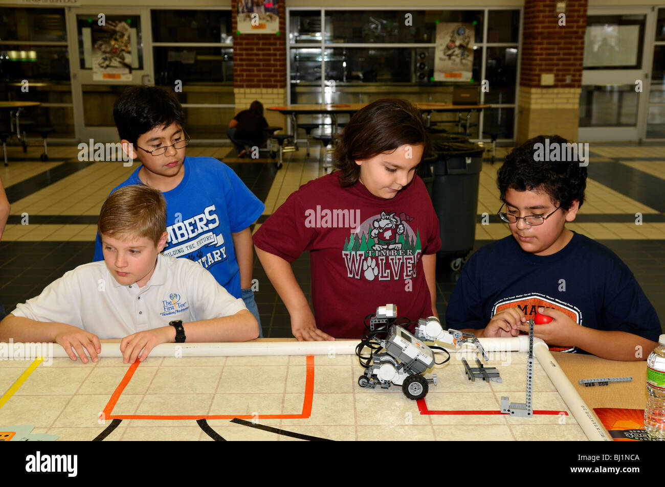 A group of elementary school students working on an engineering project. USA. Stock Photo