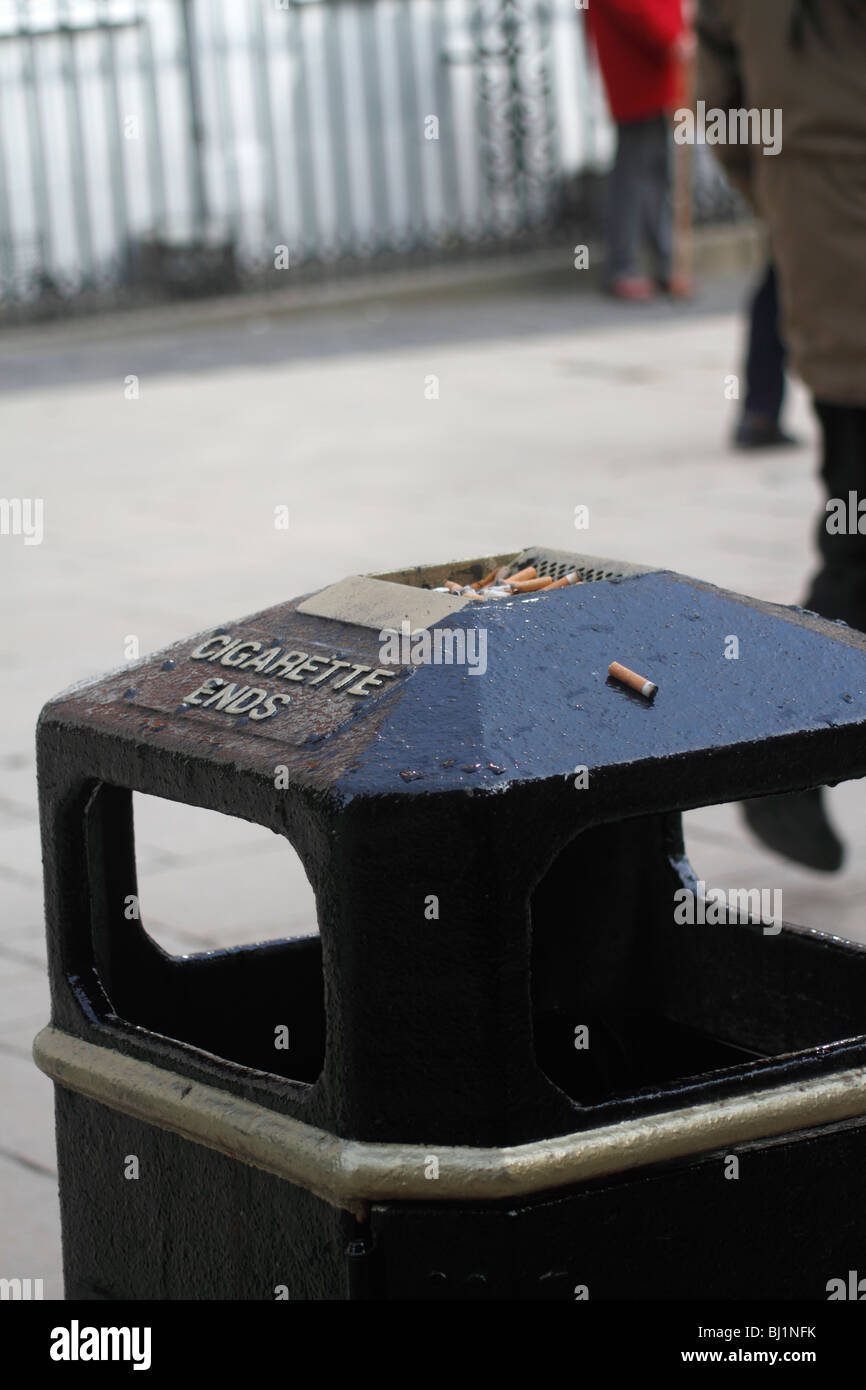 A public ashtray and waste bin in Winchester High street Stock Photo