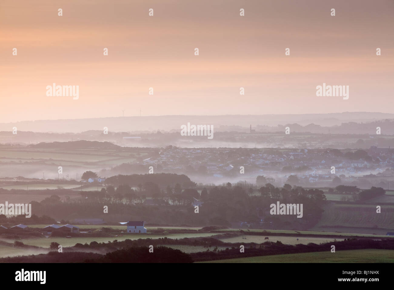 A misty dawn looking inland from St.Agnes beacon Stock Photo