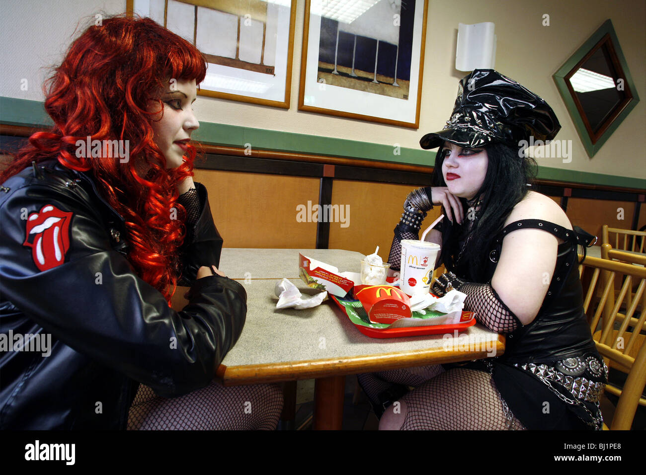 Gothic Girls in a McDonald's Restaurant, Västerås, Västmanland, Sweden Stock Photo