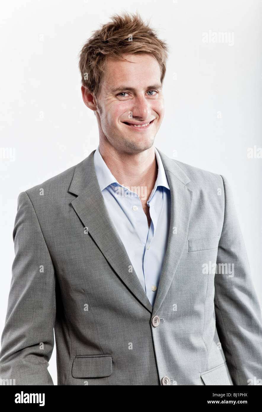 business man in grey suit on white background in studio Stock Photo - Alamy