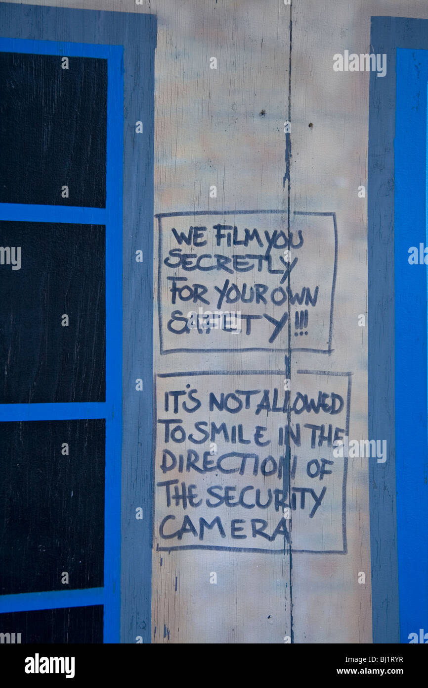 Hoarding on a building in Eindhoven, Holland.  No smiling, we are watching you.  For your own safety. Stock Photo