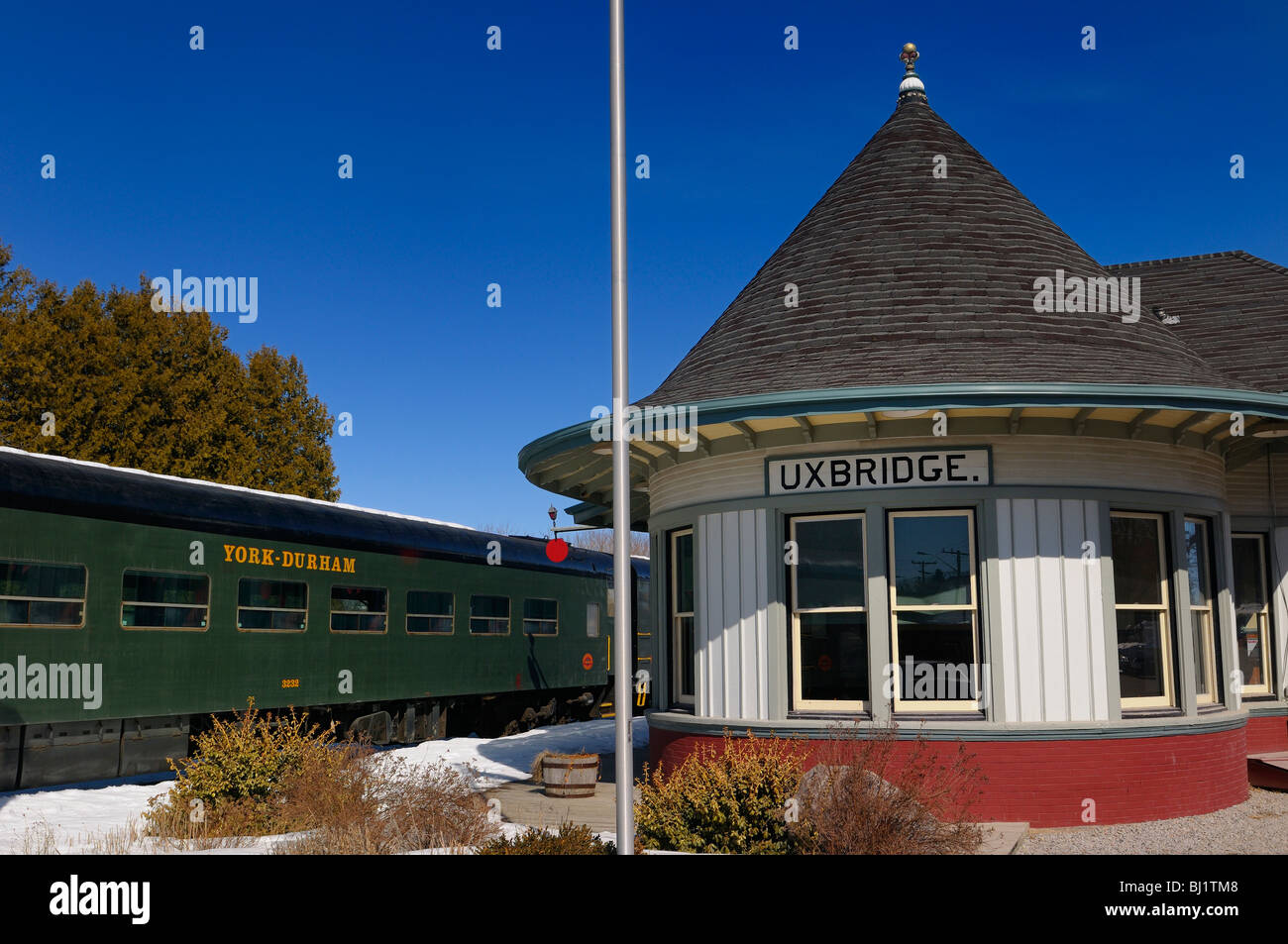 The York Durham Heritage Railway at the Uxbridge Ontario train station in winter with blue sky Stock Photo