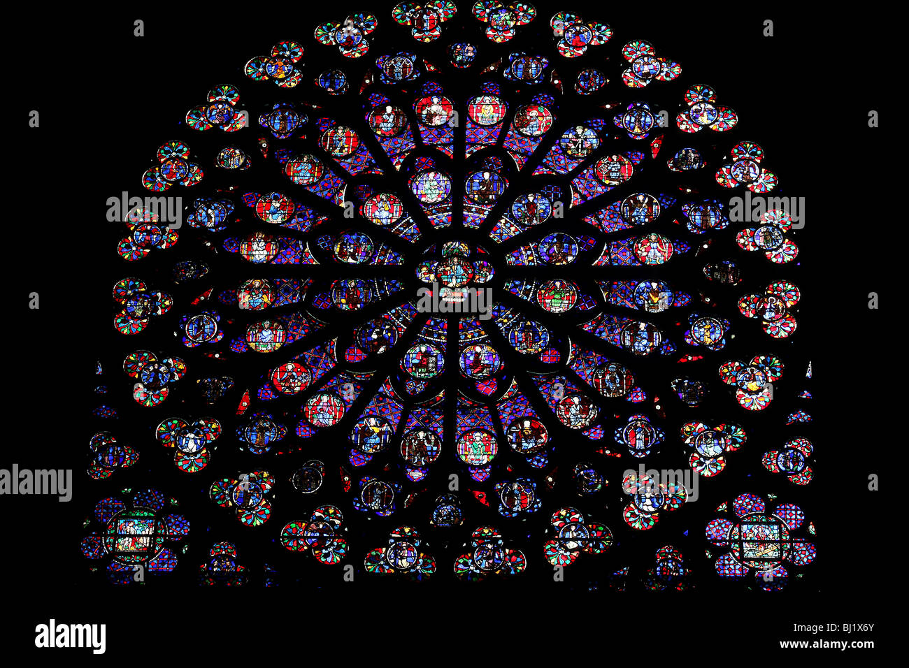 Pic by Mark Passmore/www.markpassmore.com Detail pic of a stained glass window inside the Notre Dame Cathedral, Paris. Stock Photo