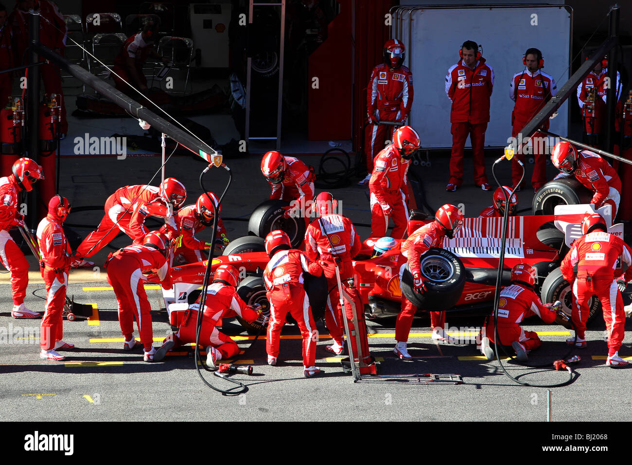 Fernando Alonso of the 2010 Ferrari team doing a pit stop at the ...