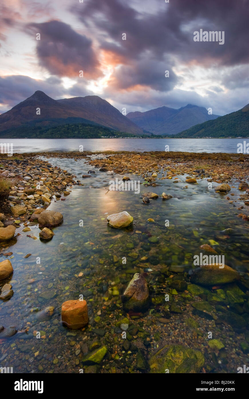 Sunrise view of the Pap of Glen Coe, from the shore of Loch Linnhe Stock Photo