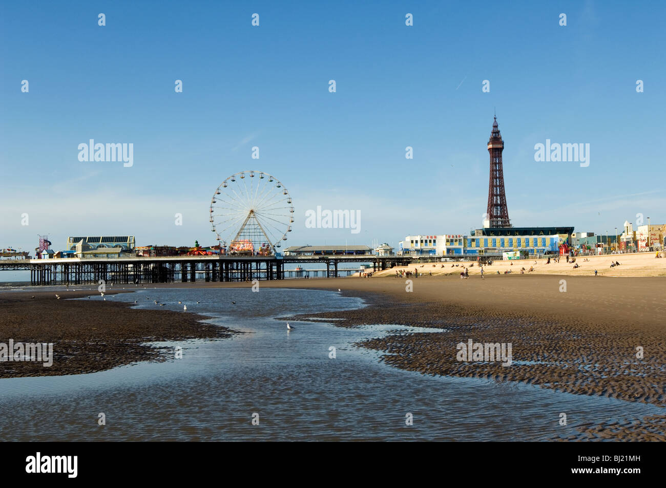 Blackpool Tower, the piers and the Pleasure Beach are the landmarks of Blackpool's Golden Mile, Lancashire, United Kingdom Stock Photo