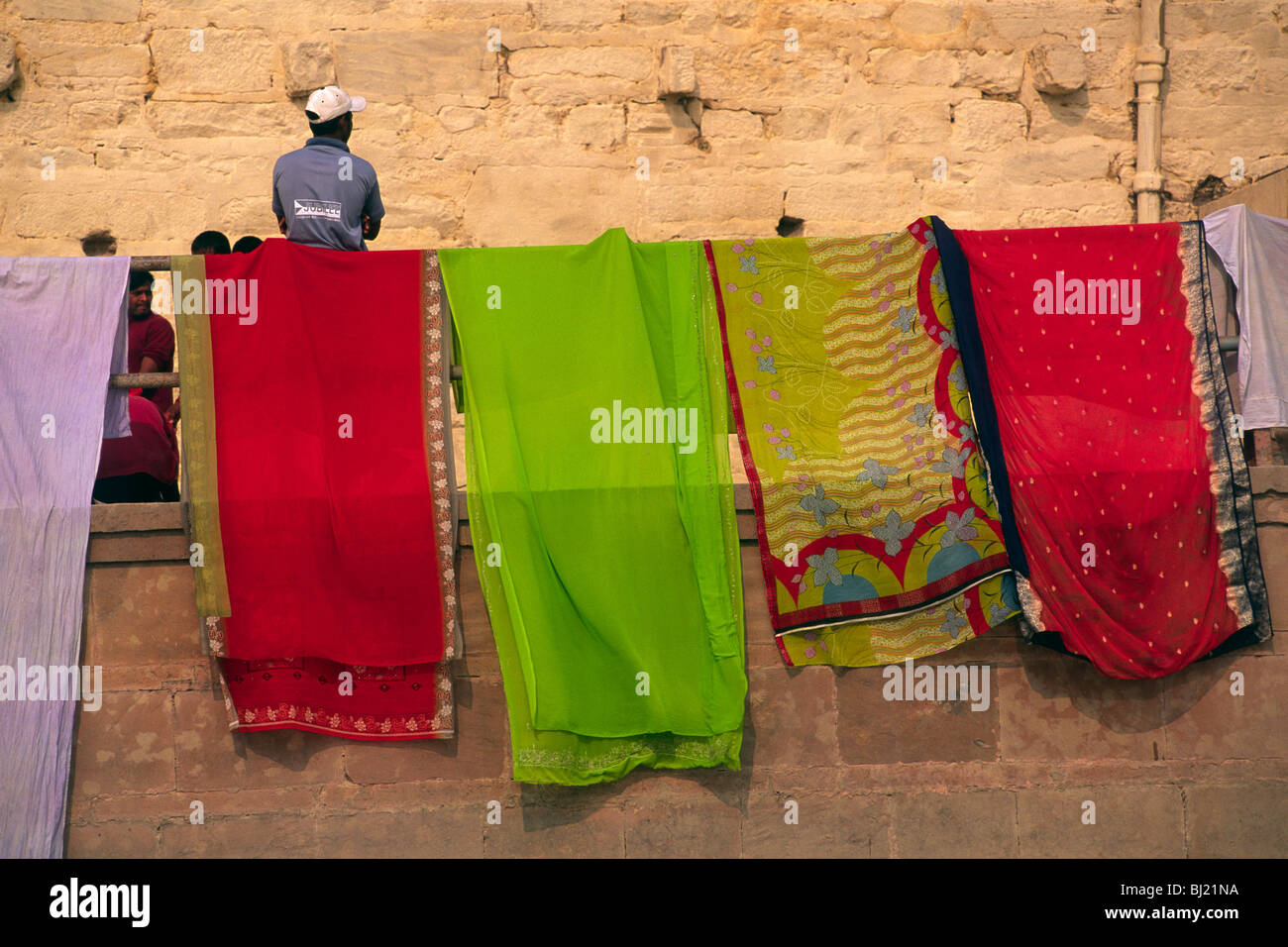 India, Varanasi, Ganges river, laundry, saris drying Stock Photo