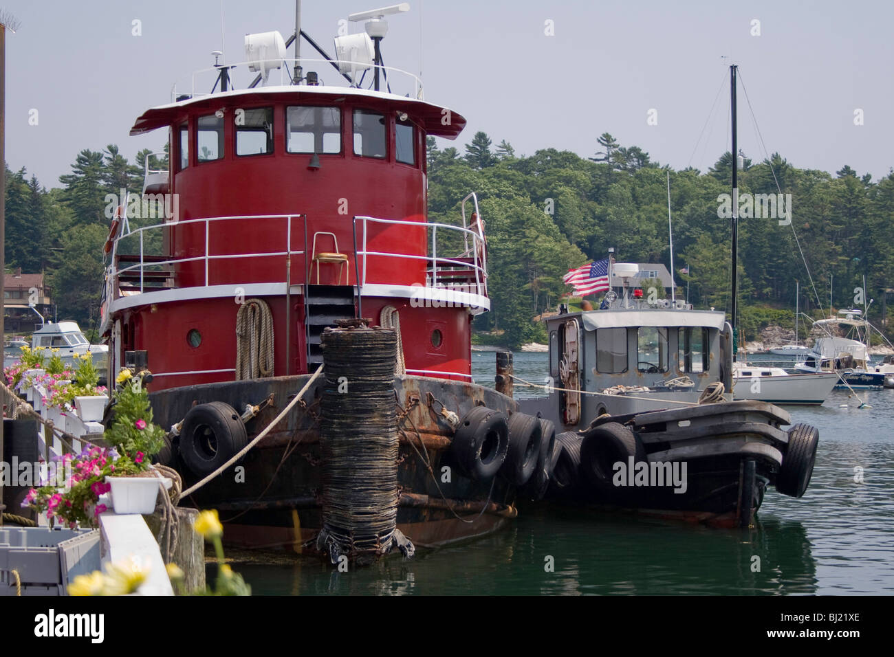 Tugboats Alongside at Robinson's Wharf, Townsend Gut, Boothbay, Maine Stock Photo