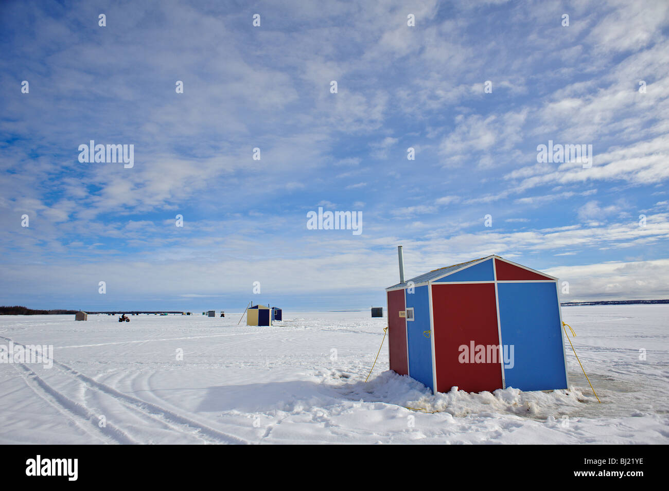 Winter Ice Fishing Huts on Chaleur Bay New Brunswick Canada Stock Photo