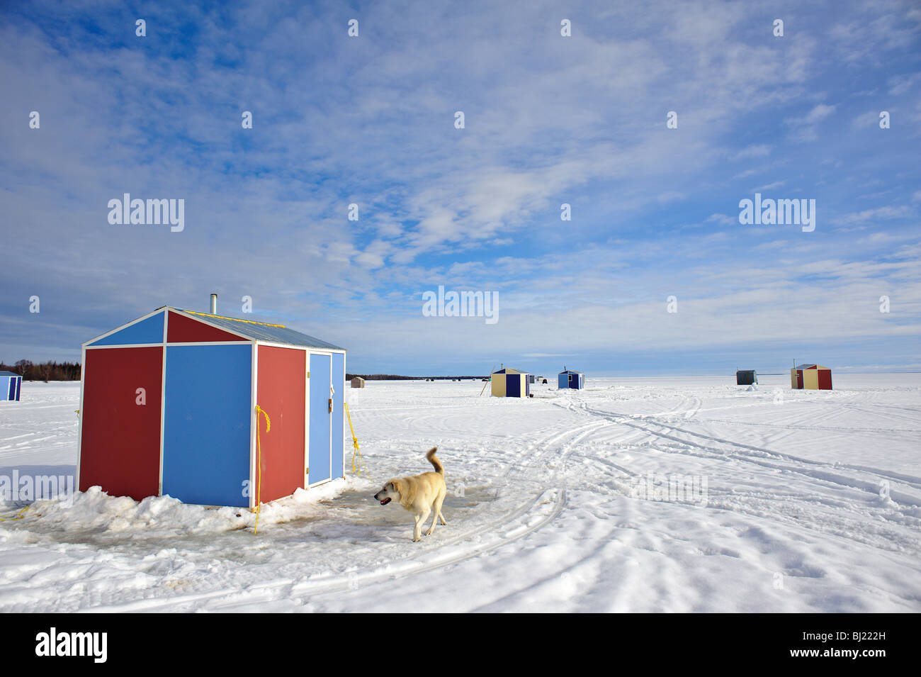 Winter Ice Fishing Huts on Chaleur Bay New Brunswick Canada Stock Photo