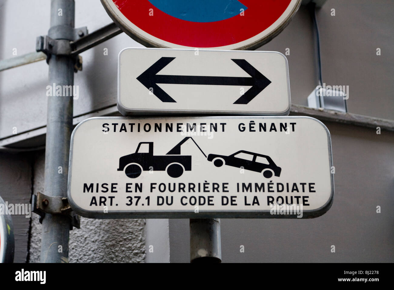 Sign indicating a tow away zone in the French city of Lyon, France. Stock Photo