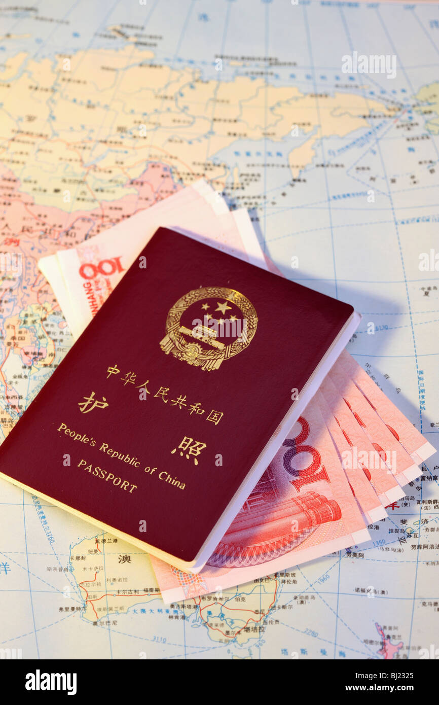 Chinese Yuan note and passport on the map,still life Stock Photo Alamy