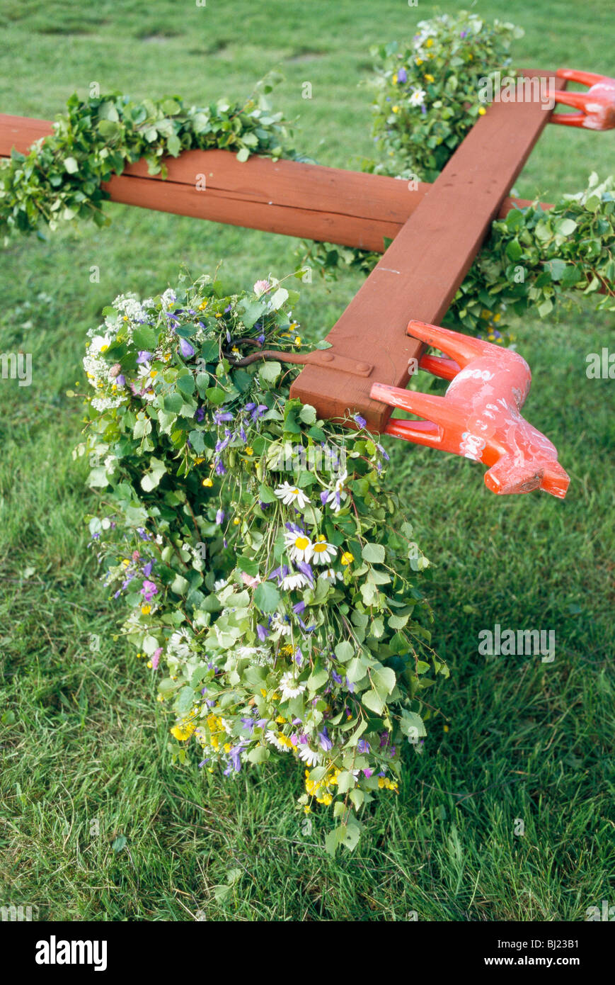 Maypole on the grass, Sweden. Stock Photo