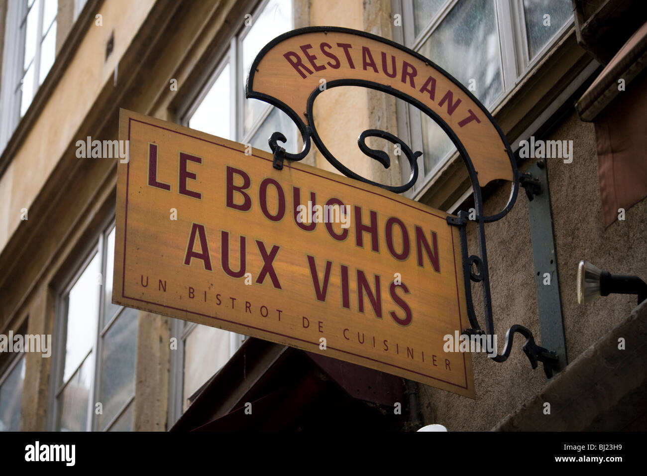 Sign outside Bouchon Aux Vins restaurant / cafe / bistro bar in the city of Lyon, France. Stock Photo