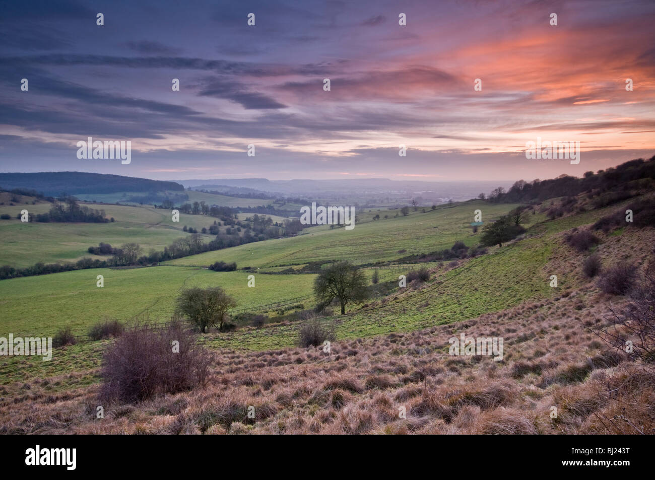 Sunset over Cotswold hills, near Haresfield Beacon, Gloucestershire, UK Stock Photo
