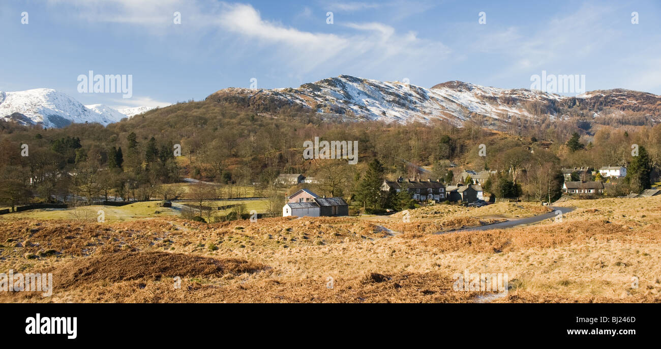 Elterwater Village with Snow Covered Lingmoor Fell and Cumbrian Mountains Lake District Cumbria England UnitedKingdom UK Stock Photo