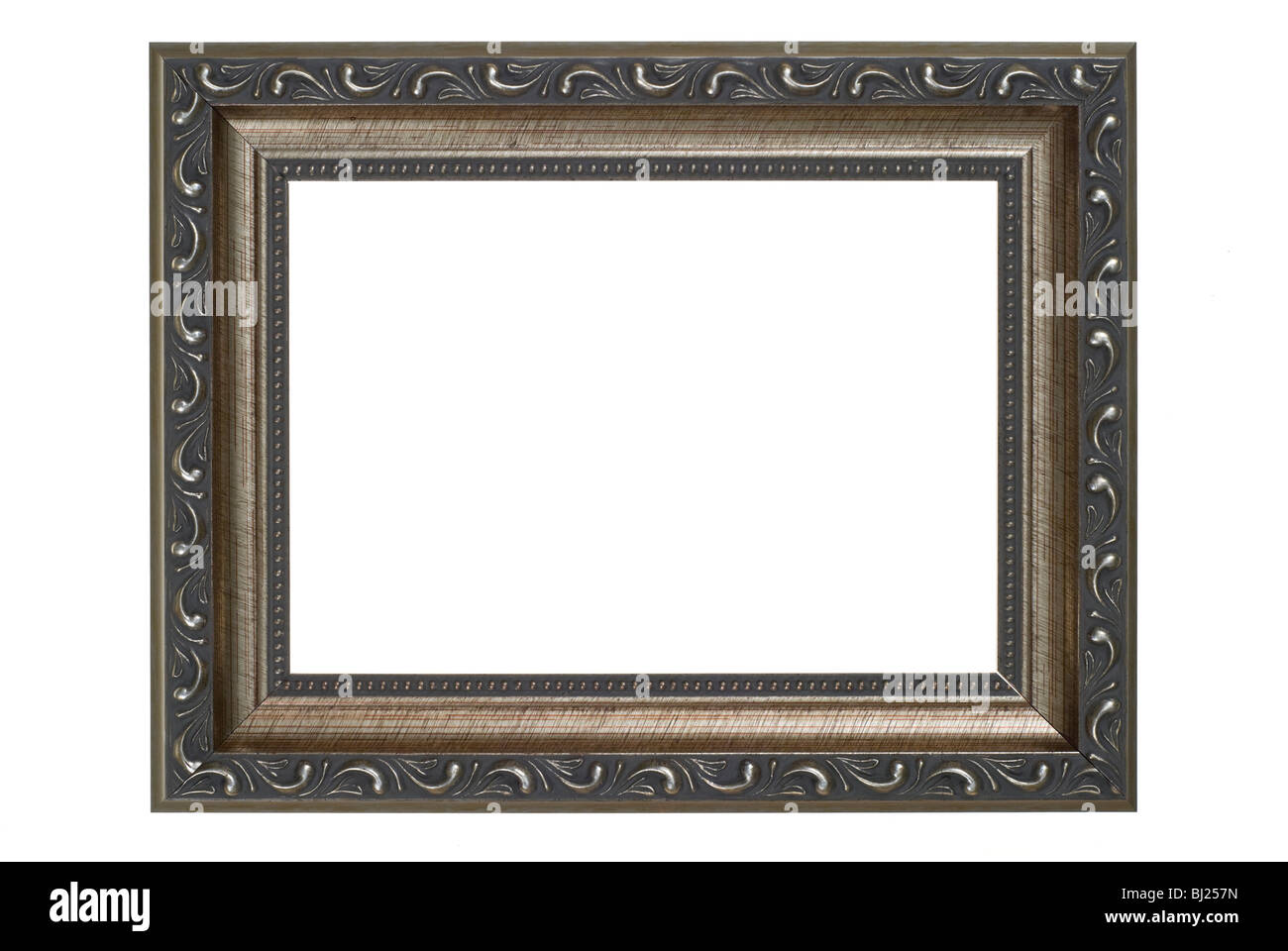 Empty picture frame in antique silver, isolated on white. Stock Photo