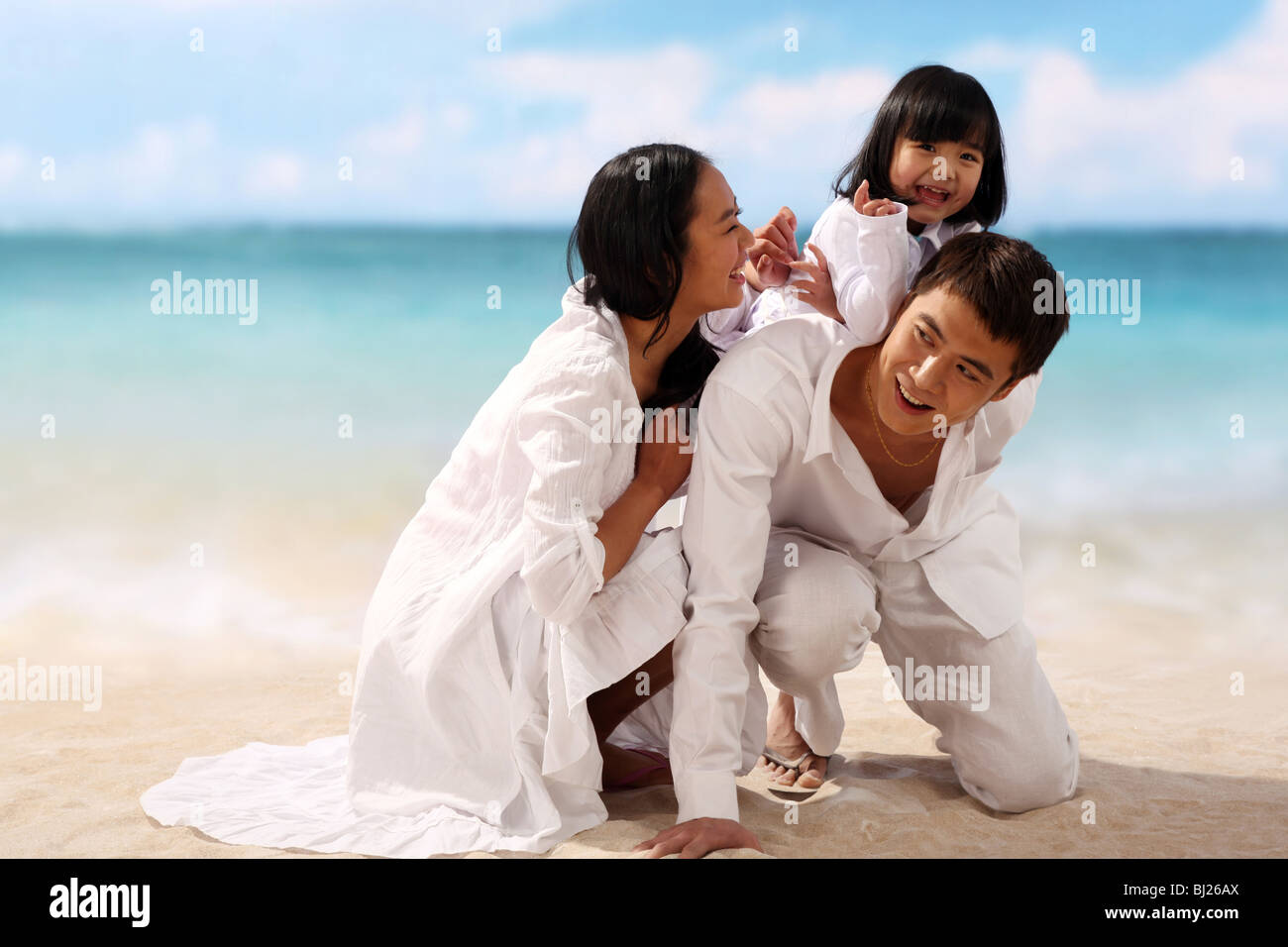 Portrait of family on beach Stock Photo