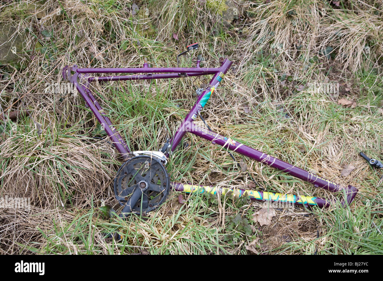 Fly-tipped bicycle frame in Northamptonshire field, England Stock Photo