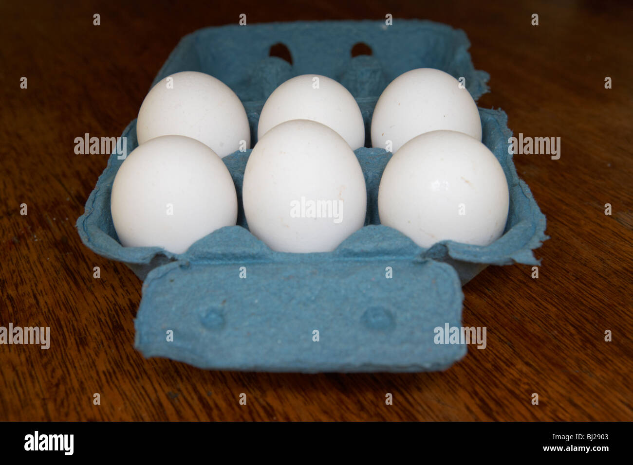 box of half dozen white organic fresh eggs Stock Photo