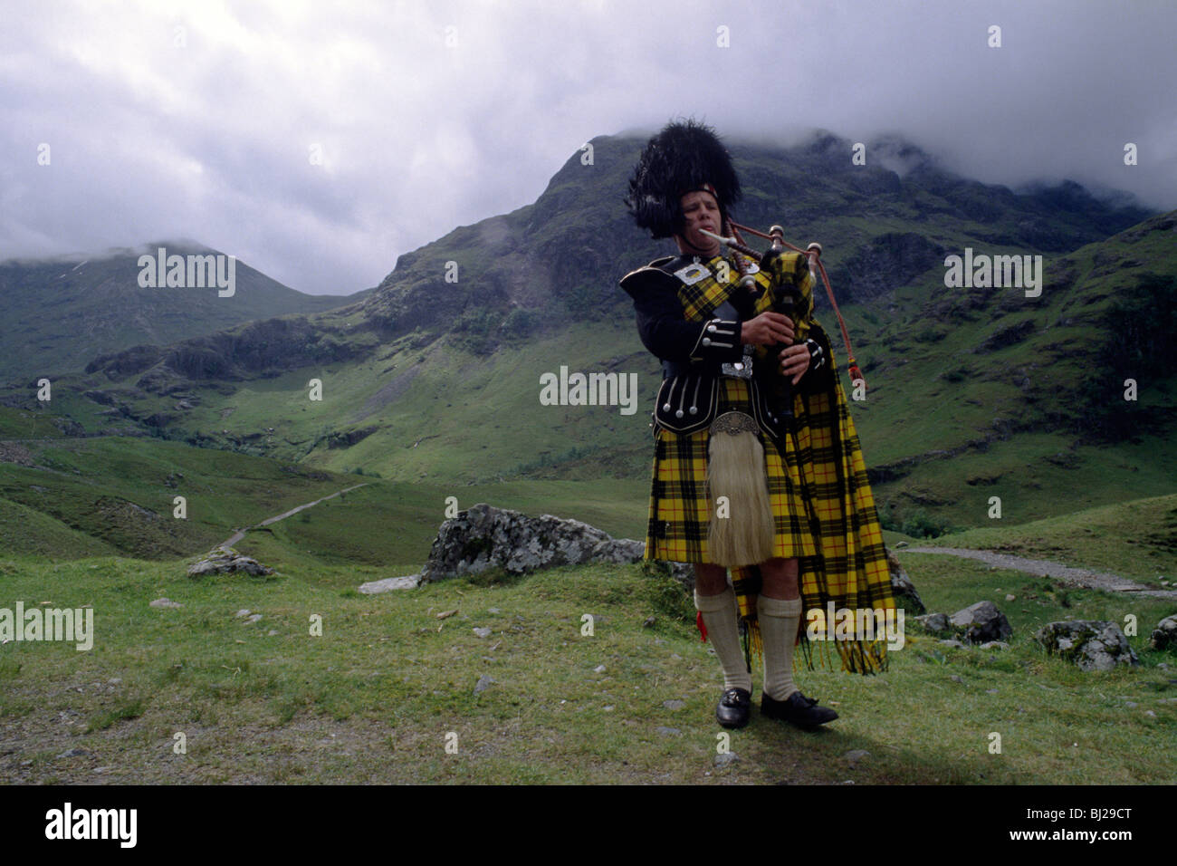 scotland, highlands, scottish piper Stock Photo - Alamy