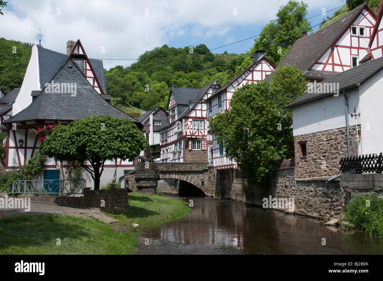 timber framed houses, river Elz, Monreal, Eifel, Rhineland-Palatinate, Germany Stock Photo