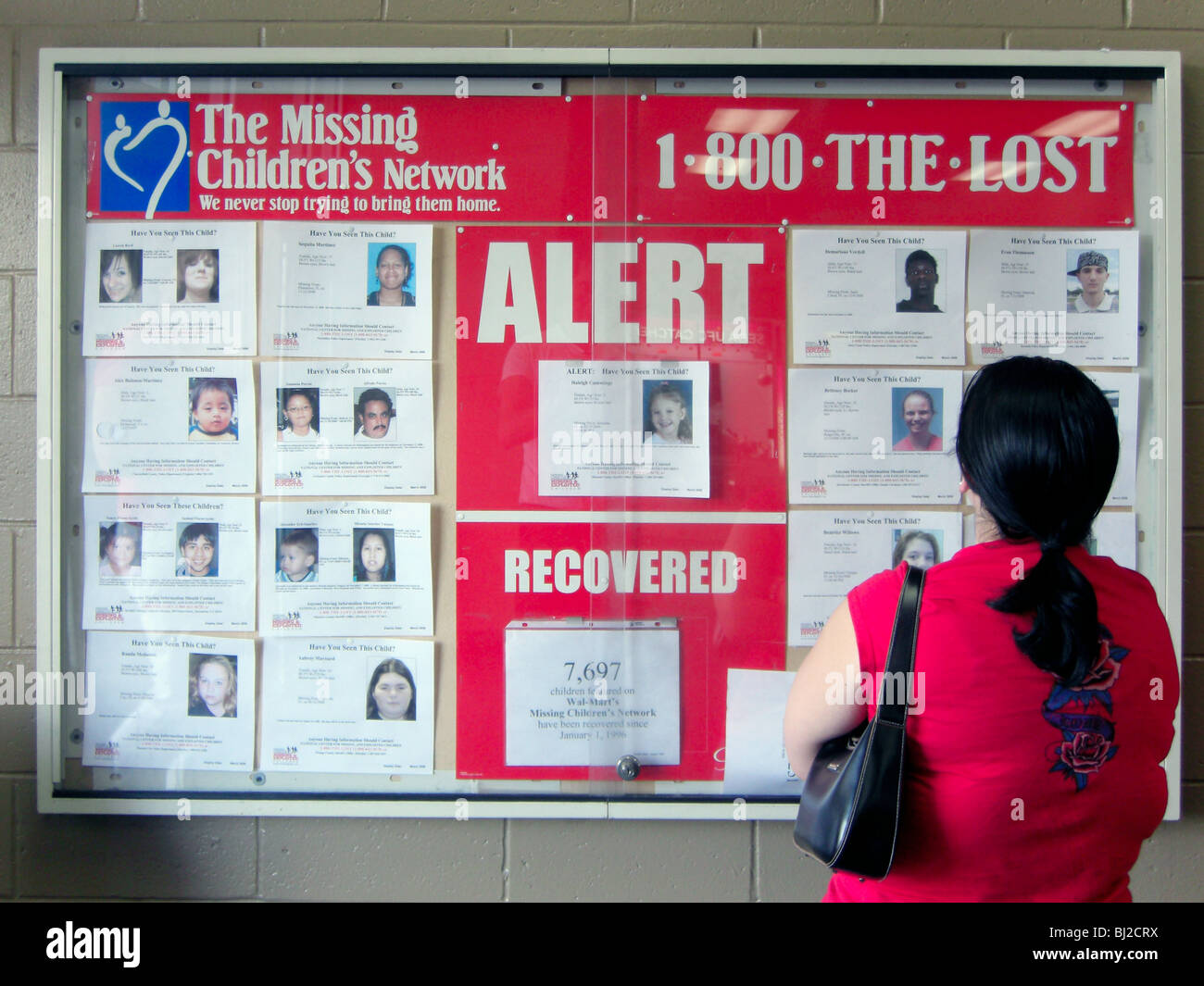 Missing persons bulletin board notice USA: alert, missing, children, people, woman Stock Photo