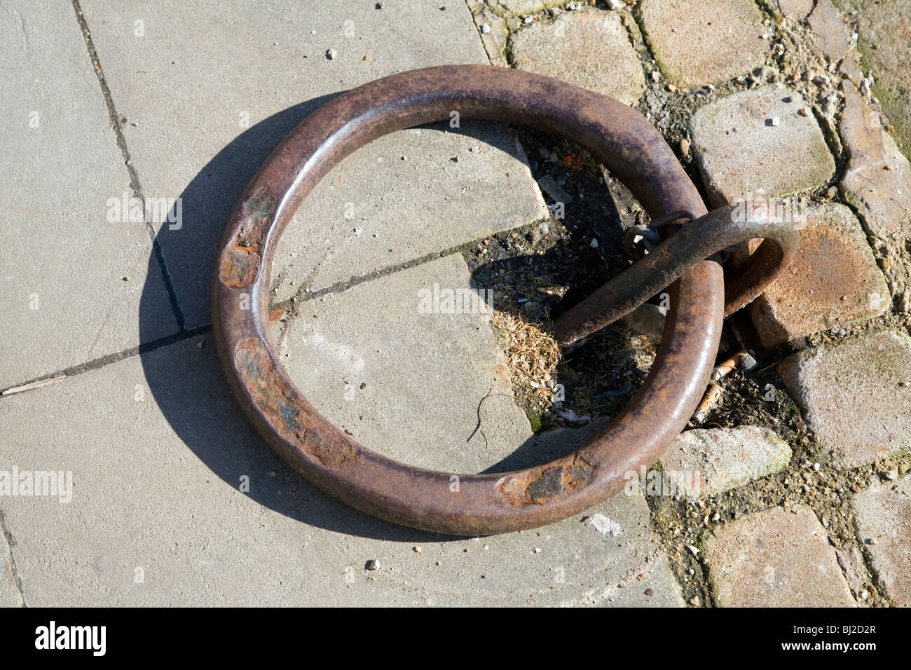 Mooring ring with ropes Stock Photo