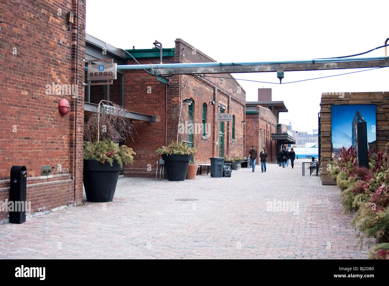 Tourists walking on the cobblestone street at the distillery district Stock Photo