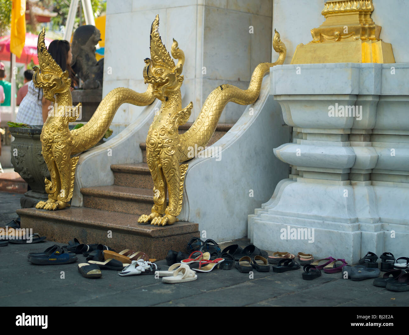 Shoes outside the temple steps in a wat in Bangkok Stock Photo Alamy