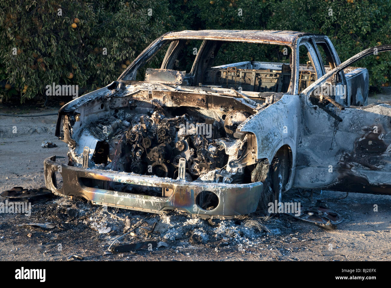 Torched 'Compact' stolen pickup. Stock Photo
