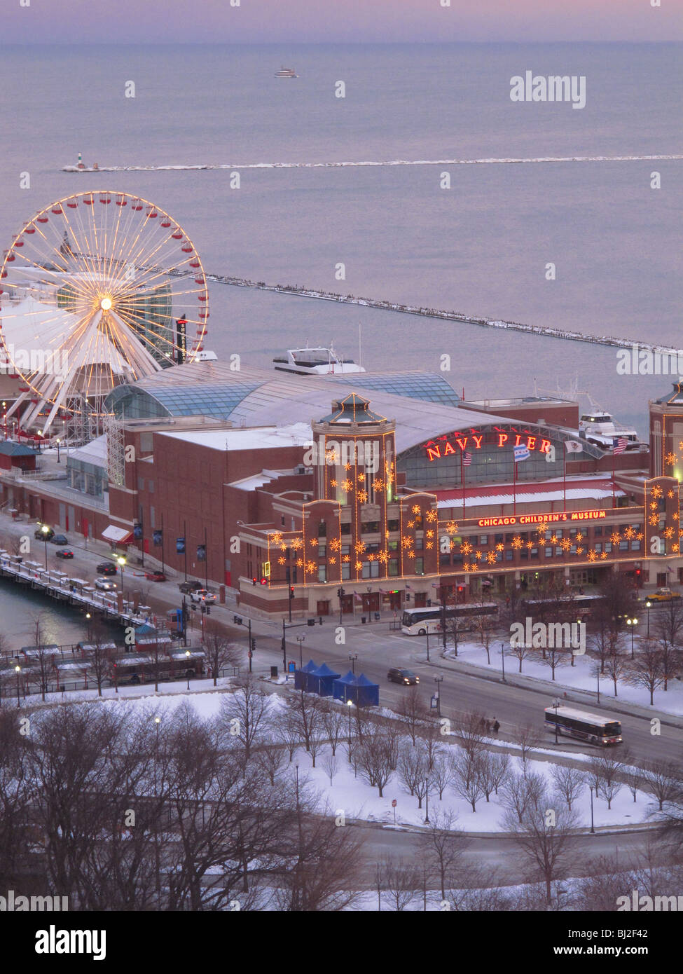 USA Chicago Illinois - aerial of the Navy Pier and ferris wheel in Winter on Lake Michigan Stock Photo