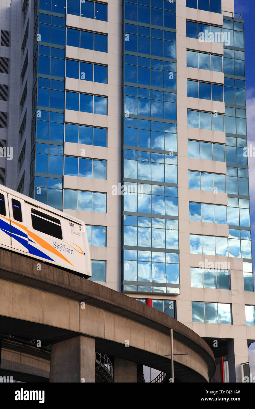 Skytrain light rapid transit with hi rise, Vancouver, British Columbia Stock Photo