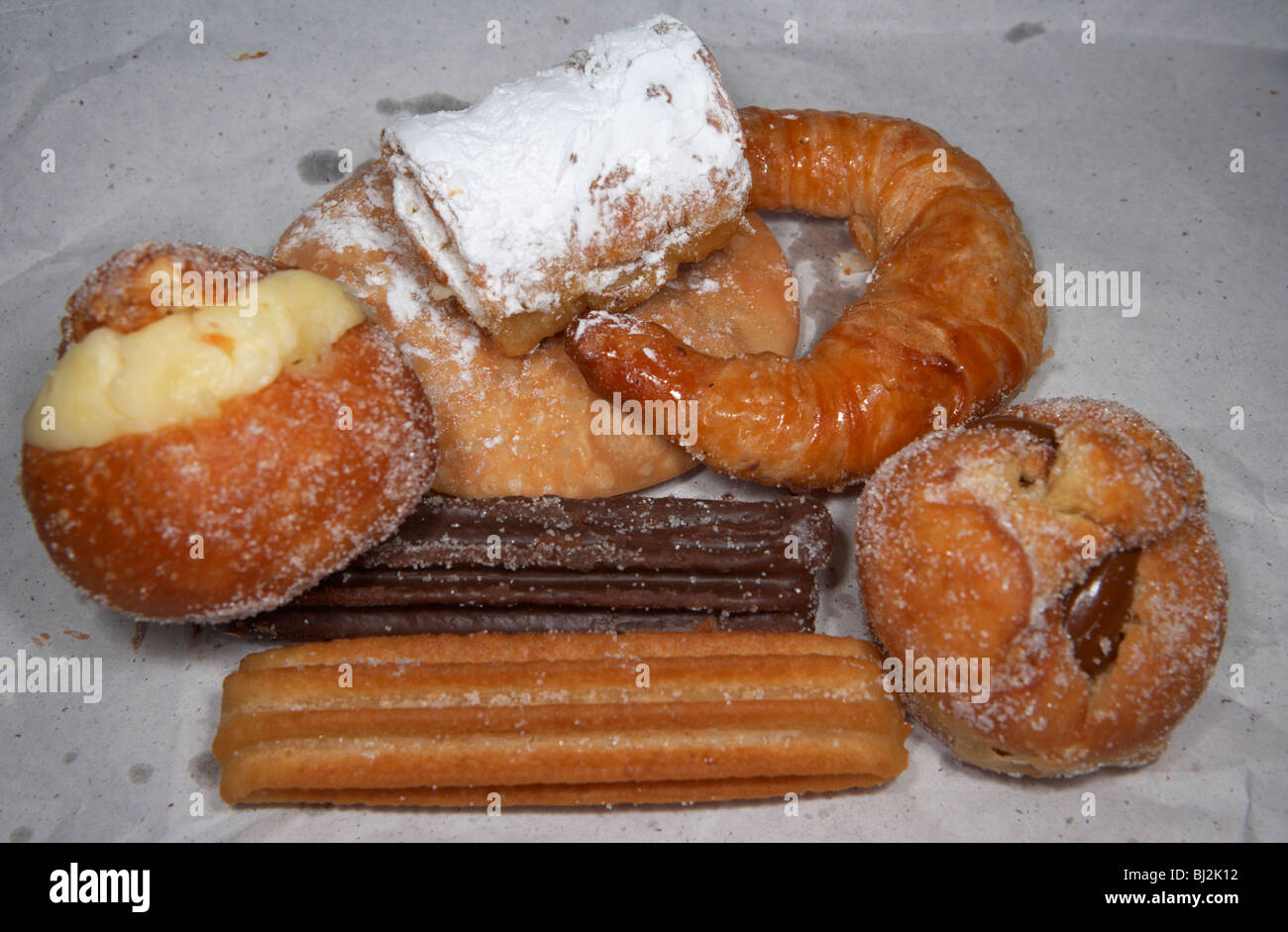 selection of argentinian morning pastries on white paper fresh from a bakery often used as breakfast buenos aires argentina Stock Photo