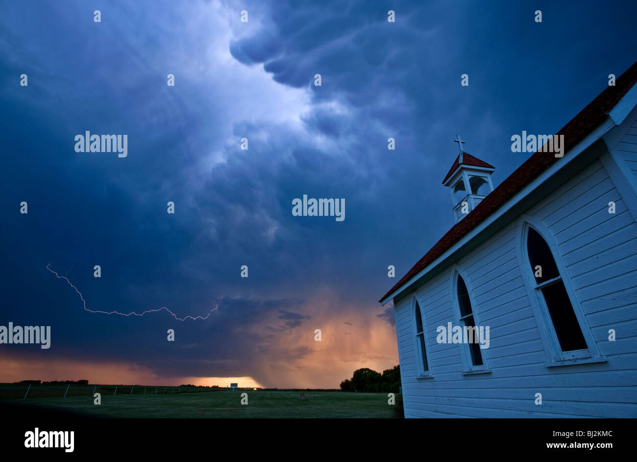Storm Clouds over Saskatchewan country church Stock Photo - Alamy